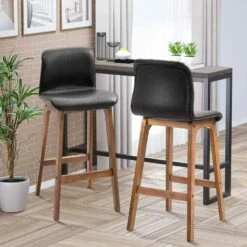 HOMCOM 2 Piece Bar Stools - PU Leather Seats With Wooden Frame & Footrests - Brown - 835-161V70DR